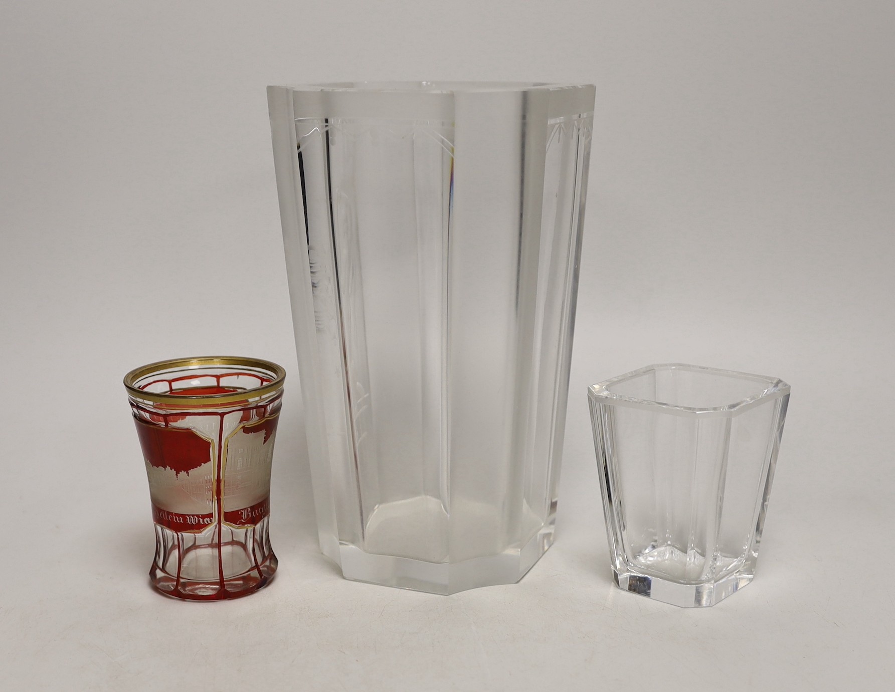 A 19th century Bohemian overlaid tumbler and two engraved vases. Tallest 21cm